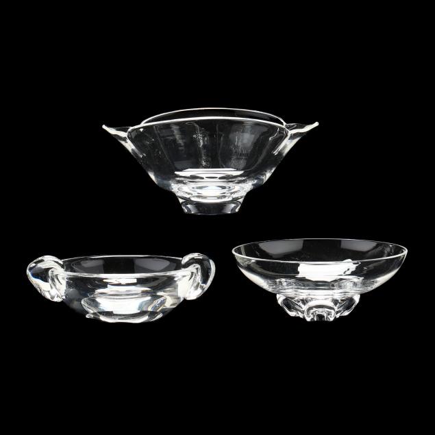 Appraisal: THREE STEUBEN CRYSTAL BOWLS Mid th century including a leaf