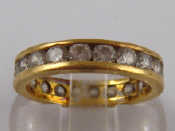 Appraisal: A yellow metal tests carat gold clear stone eternity ring