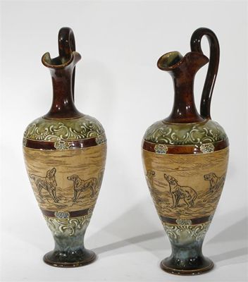 Appraisal: A pair of Doulton Lambeth stoneware ewers by Hannah Barlow