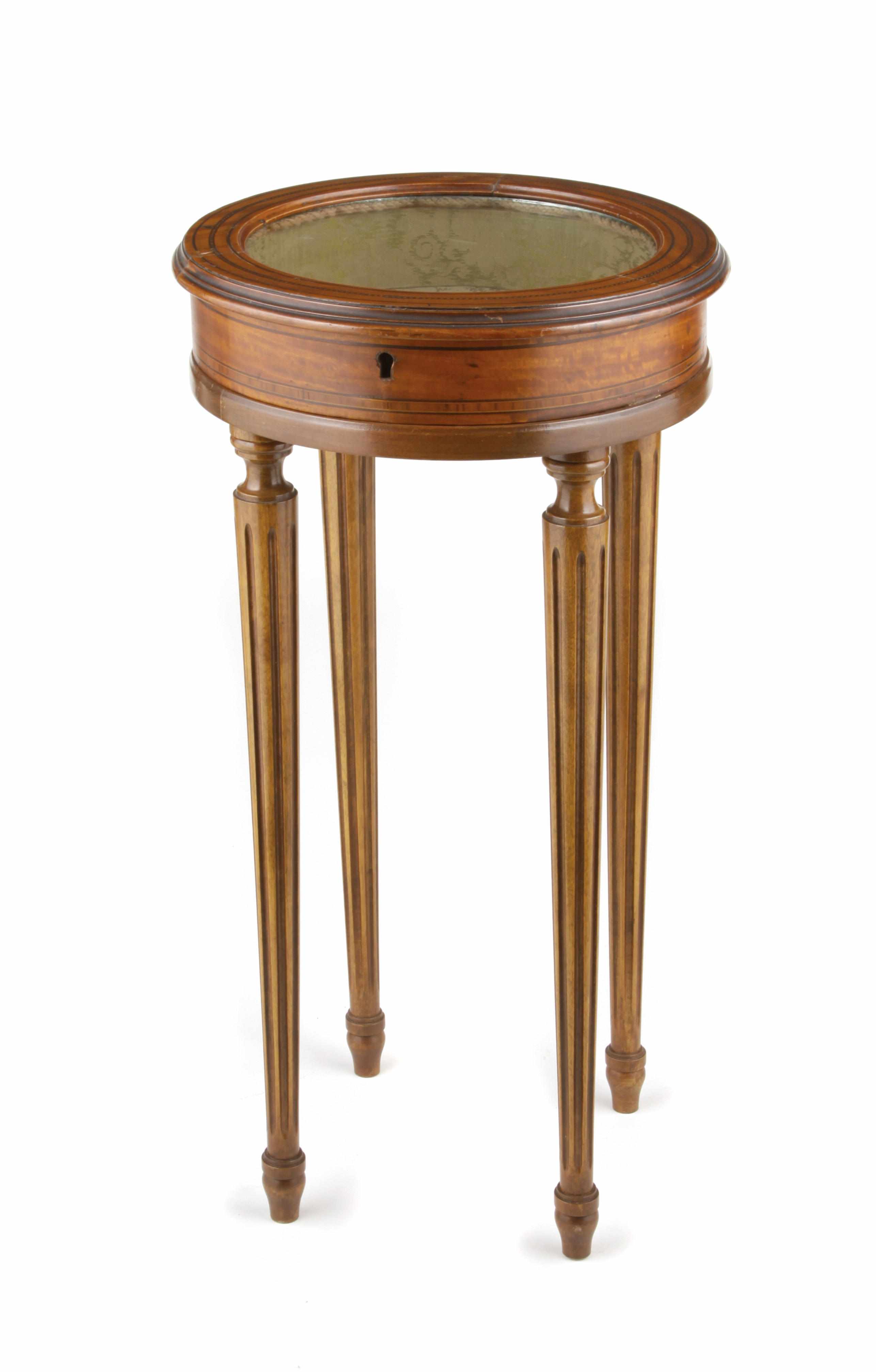 Appraisal: A George II style inlaid fruitwood circular vitrine table height