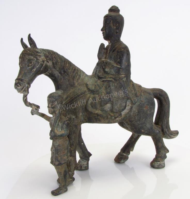 Appraisal: Bronze Oriental Figure on Horseback with Guide depicting priest in