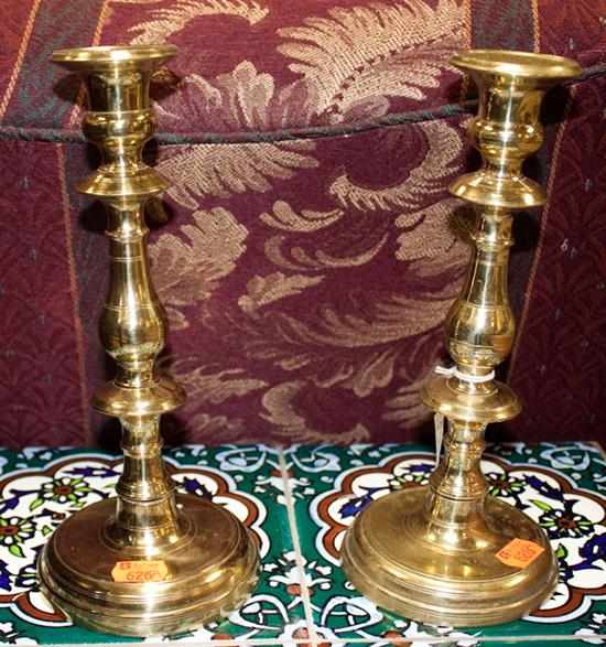 Appraisal: Pair of Russian sand cast candlesticks Estimate - No condition