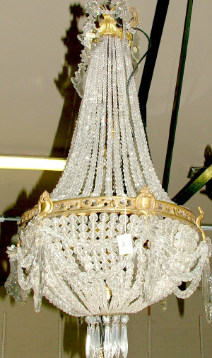 Appraisal: A Regency style bag shaped chandelier with gilt brass frame