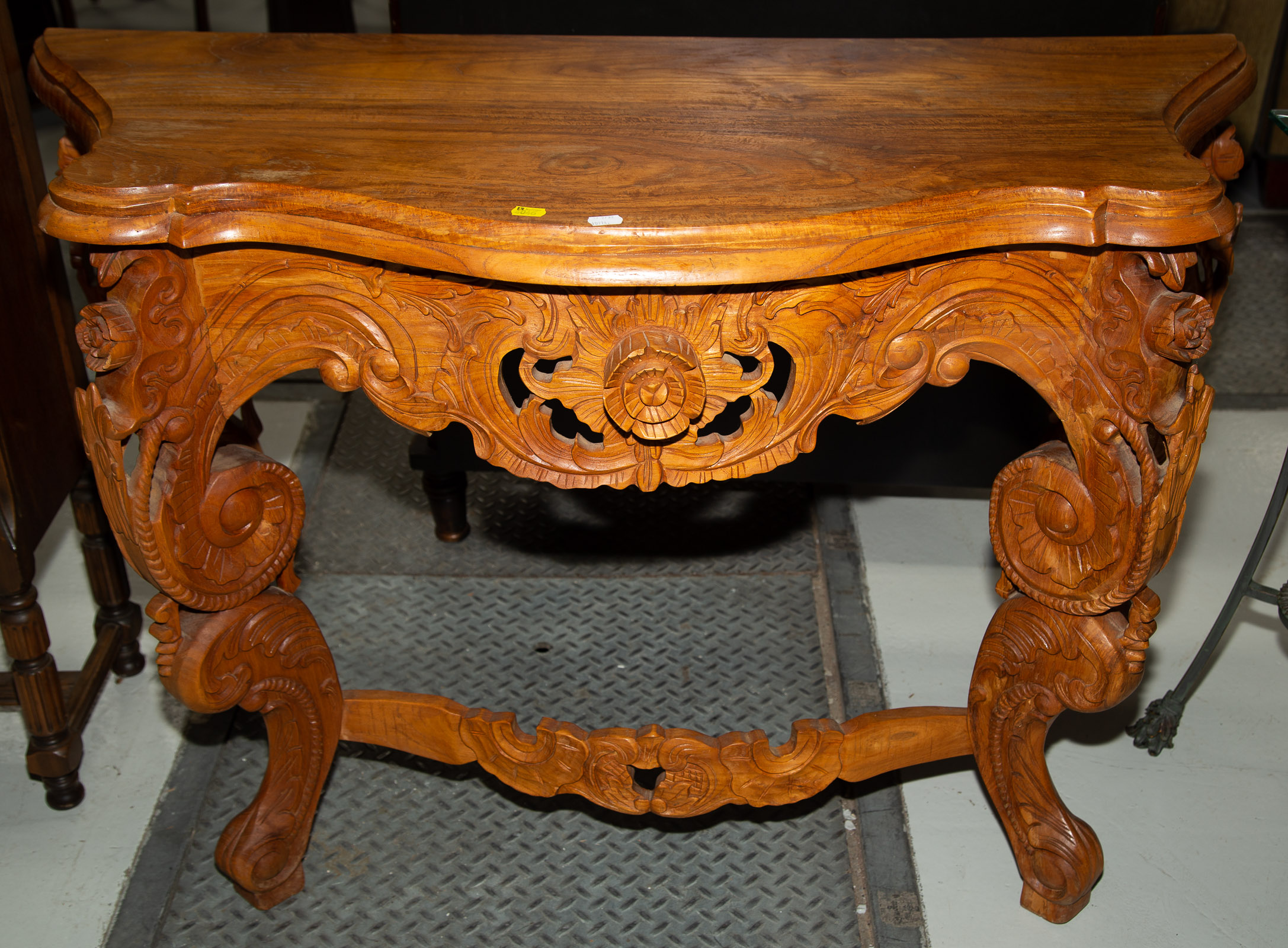 Appraisal: MODERN ROCOCO STYLE MAHOGANY CONSOLE TABLE Possibly Indian made later