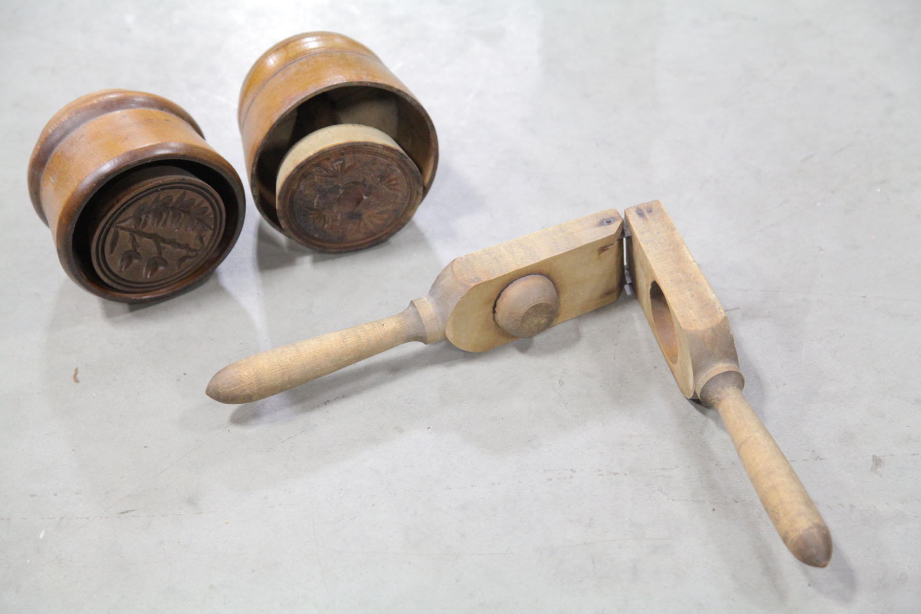 Appraisal: THREE PIECES OF WOODENWARE American late th century Two butter