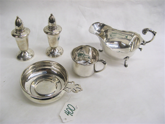 Appraisal: FIVE STERLING SILVER TABLE ITEMS the tri-footed sauce ladle L