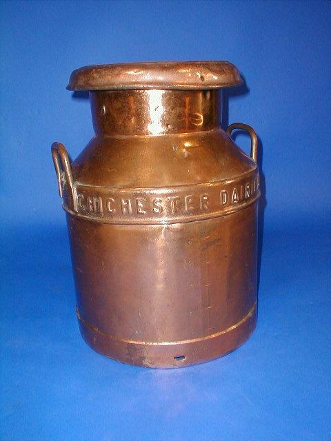 Appraisal: A Victorian Edwardian copper plated milk churn the cover stamped