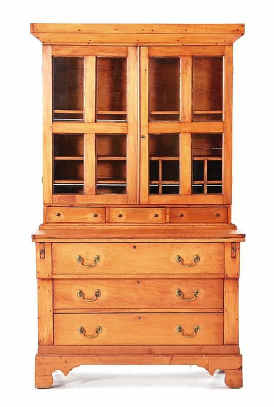 Appraisal: American Cherry writing desk and bookcase th century square cornice