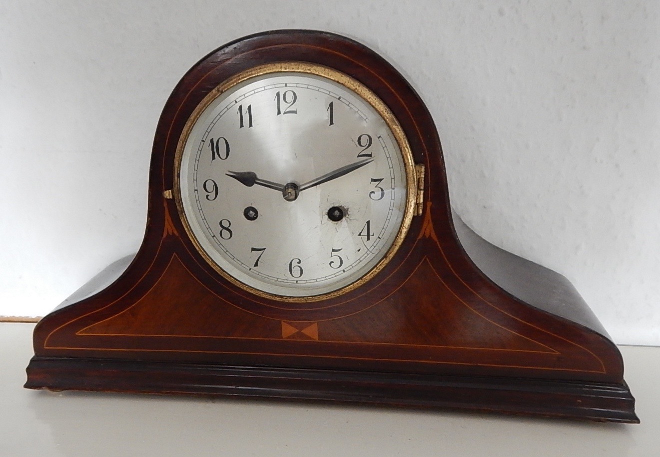 Appraisal: A s Napoleon hat mahogany cased mantel clock with silvered