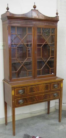 Appraisal: Vintage period-style mahogany bookcase-secretary with two-drawer base and glass-door bookcase