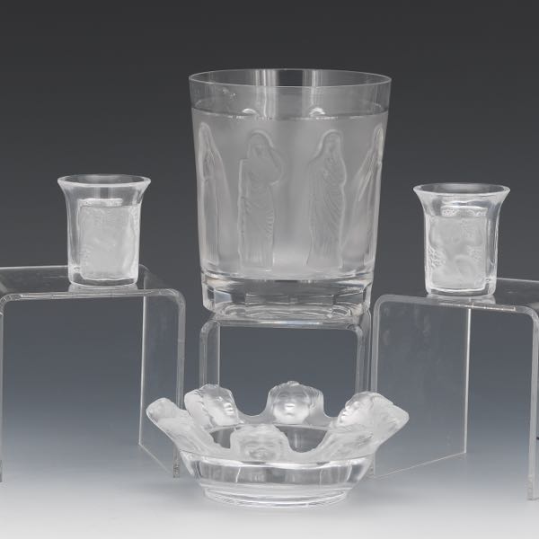 Appraisal: SET OF FOUR LALIQUE TABLE ARTICLES One Femmes whiskey tumbler