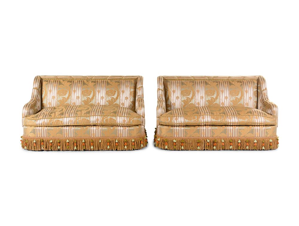 Appraisal: A Pair of Contemporary Neoclassical Style Upholstered Sofas A Pair