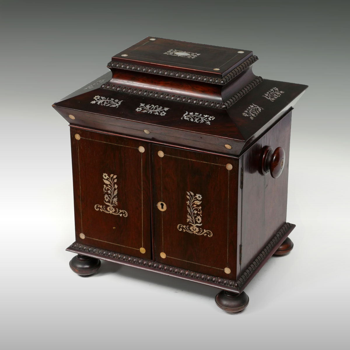 Appraisal: INLAID DRAWER CHEST WITH DESK Small Pagoda form chest with