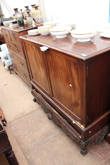 Appraisal: A TH CENTURY MAHOGANY CUPBOARD ON STAND two panelled doors