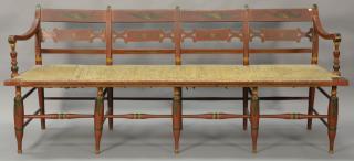 Appraisal: Windsor bench with thumb back and rush seat on turned