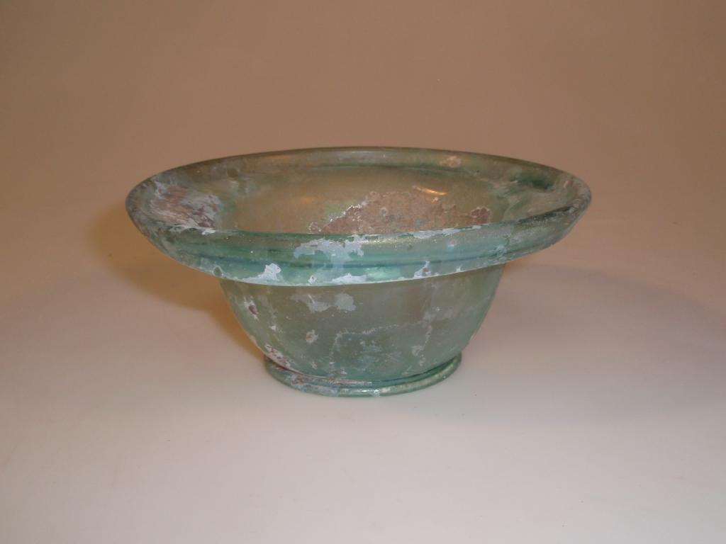 Appraisal: A deep Roman bowl made in bluish-green glass the everted