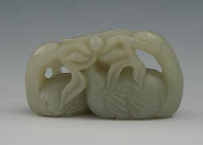 Appraisal: A Chinese Carved Jade Grouping of Two Ducks Light grayish