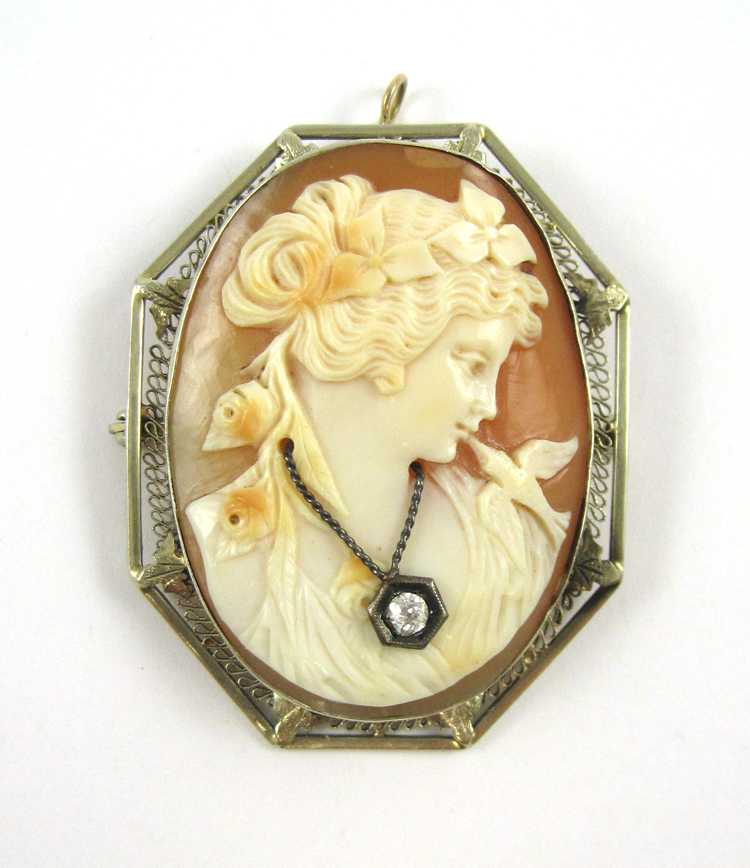 Appraisal: VICTORIAN CAMEO PENDANT BROOCH with an oval cameo side profile