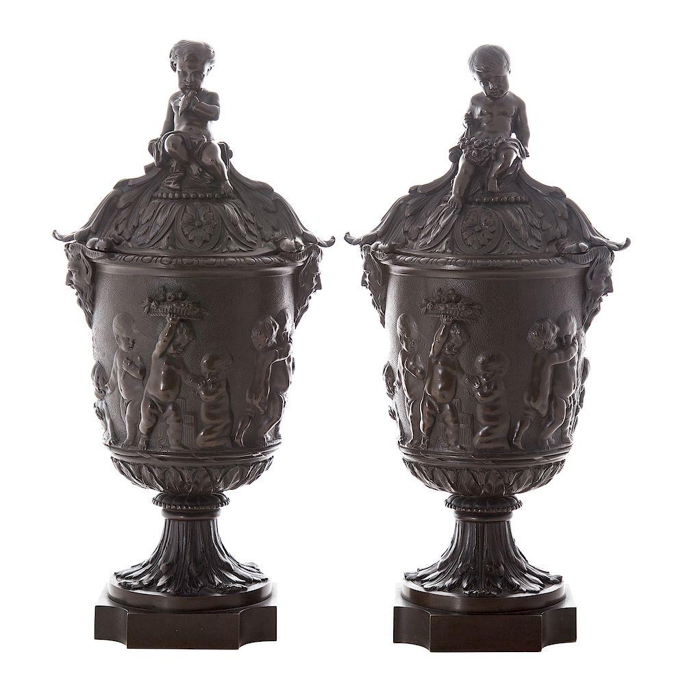 Appraisal: Pair Louis XVI style bronze urns covered urns with putti