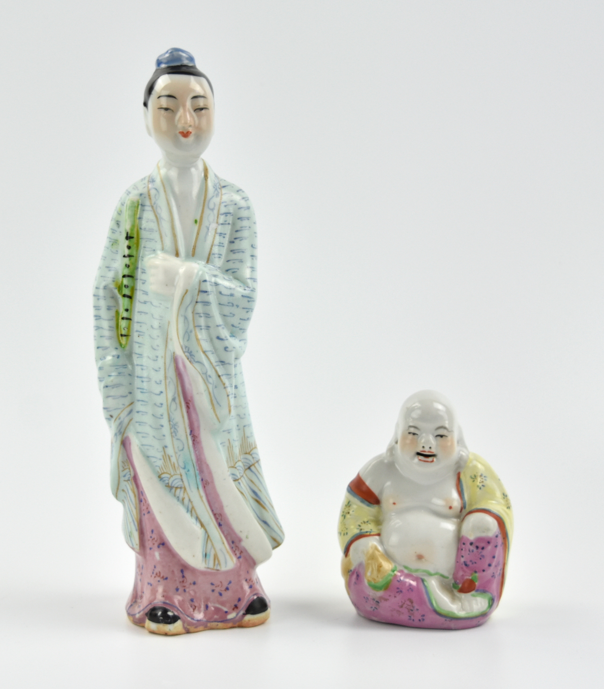 Appraisal: A Chinese porcelain figure of buddha seated with one hand