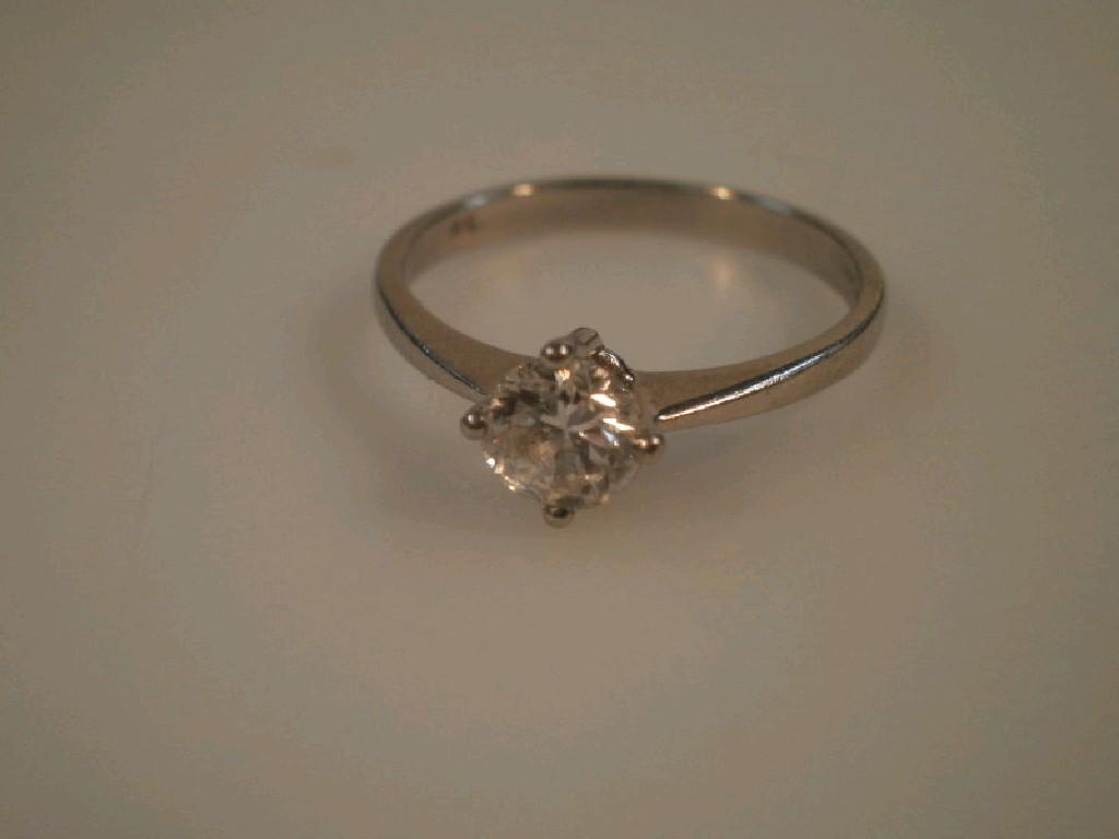 Appraisal: A solitaire diamond ring of cts in plain Tiffany setting