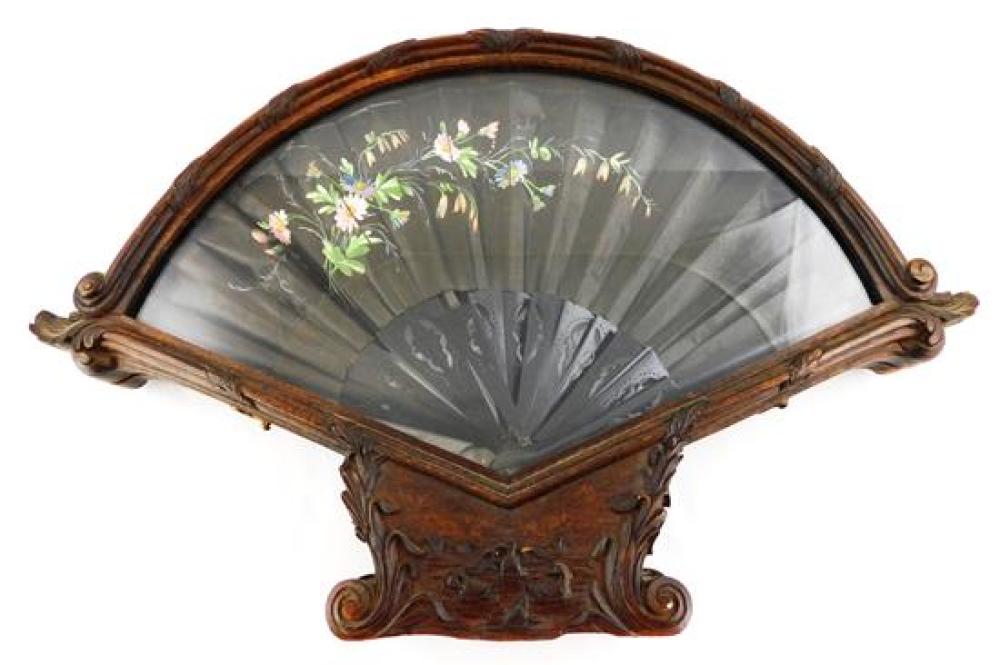 Appraisal: Elaborately carved wood fan case with hand-painted fan th C