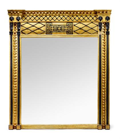 Appraisal: Empire style giltwood and ebonized wall mirror The rectangular mirror