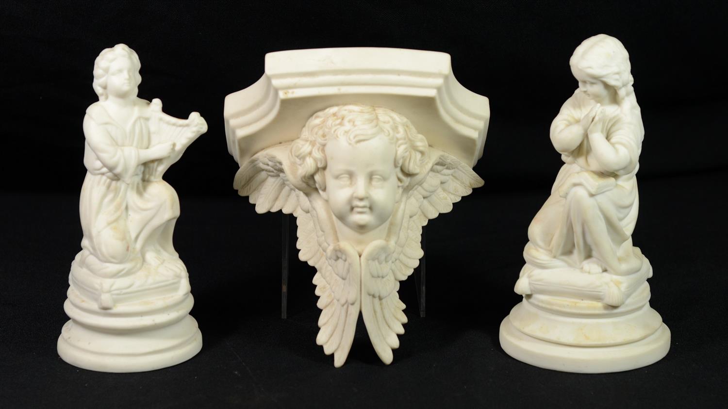 Appraisal: Parian figures cherub with harp girl kneeling in prayer tallest