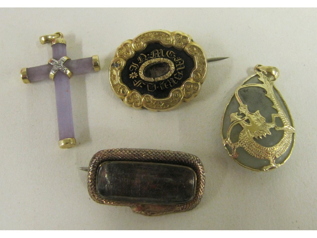 Appraisal: Lot comprising two Victorian mourning brooches a lavender jade and