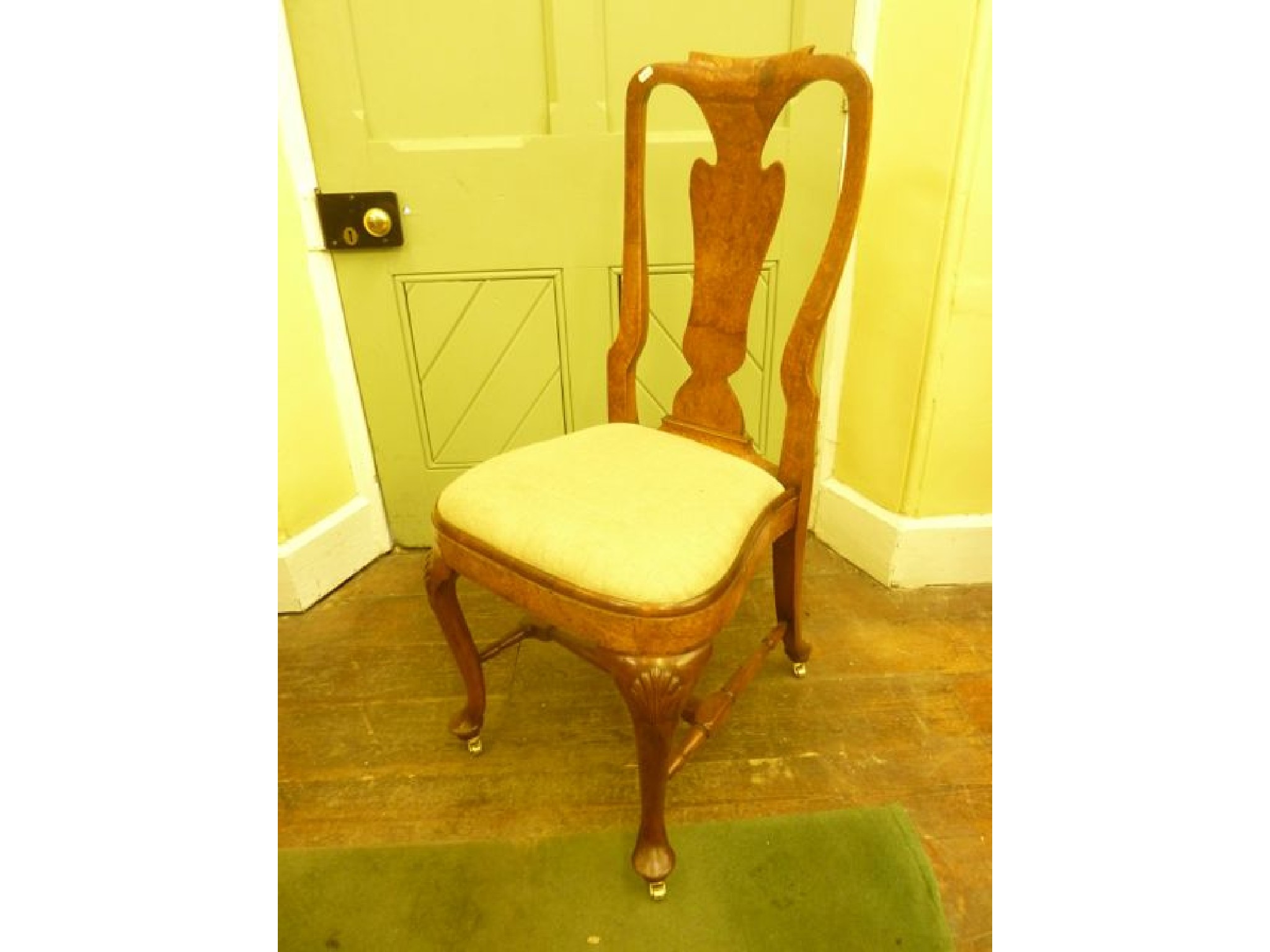 Appraisal: A Georgian walnut and figured walnut side chair in the