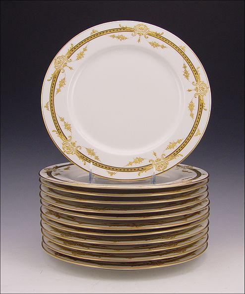 Appraisal: SET OF FRENCH LIMOGES RICHLY DECORATED SERVICE PLATES White ware