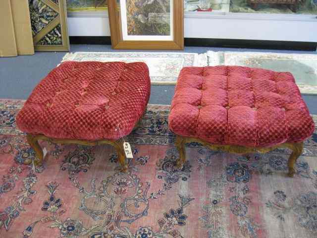 Appraisal: Pair of Ottomans Carved French Stylebases tufted red velvet tops