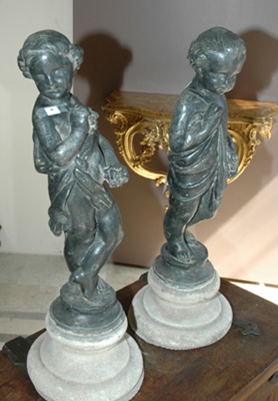 Appraisal: A PAIR OF TH CENTURY LEAD FIGURES Each cast as