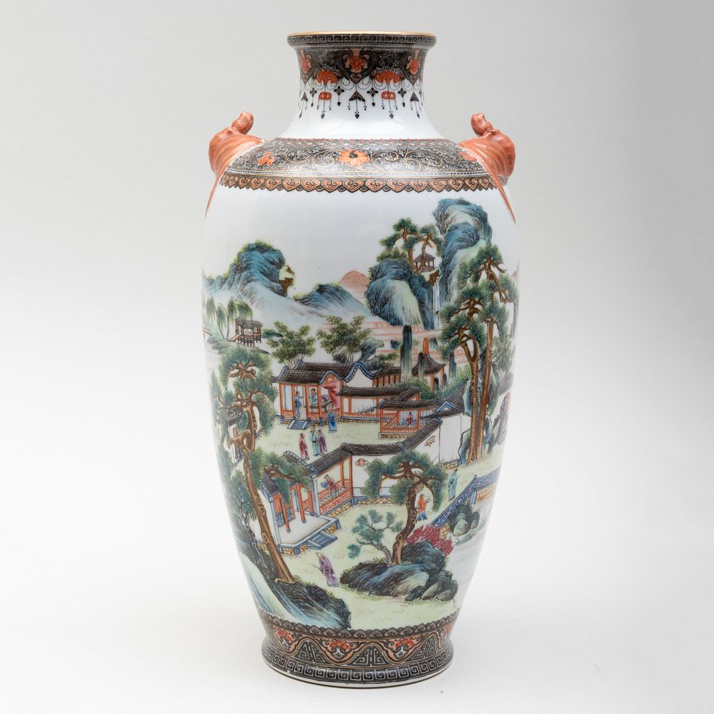 Appraisal: Chinese Porcelain Vase with Bat Form Handles Apocryphal blue character