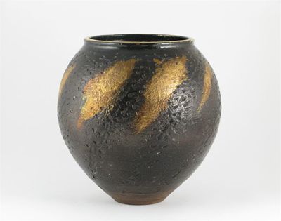 Appraisal: A Japanese stoneware vase by Itoh Tadashi with a chiselled