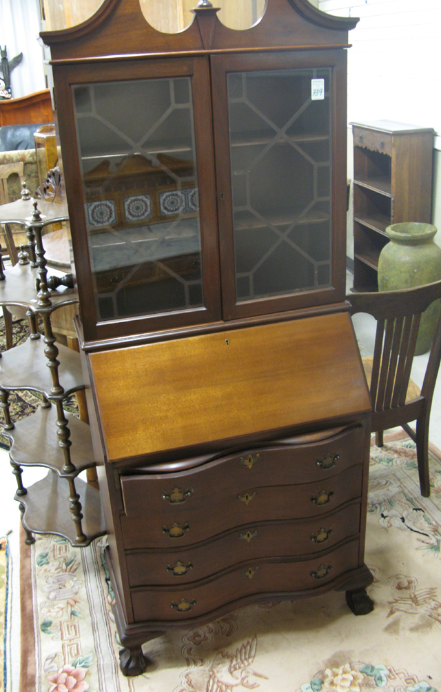 Appraisal: CHIPPENDALE STYLE MAHOGANY SECRETARY BOOKCASE American mid- th century with