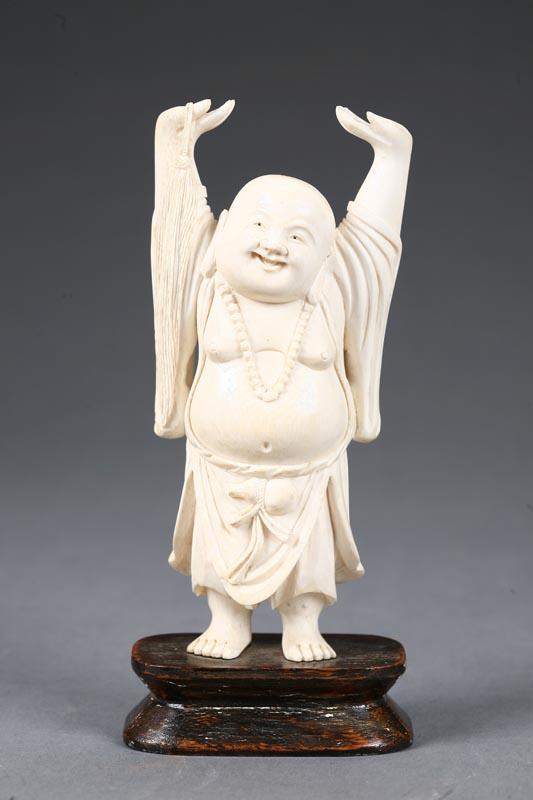 Appraisal: IVORY BUDDHA CARVING Asian Hotei with upstretched arms and fly