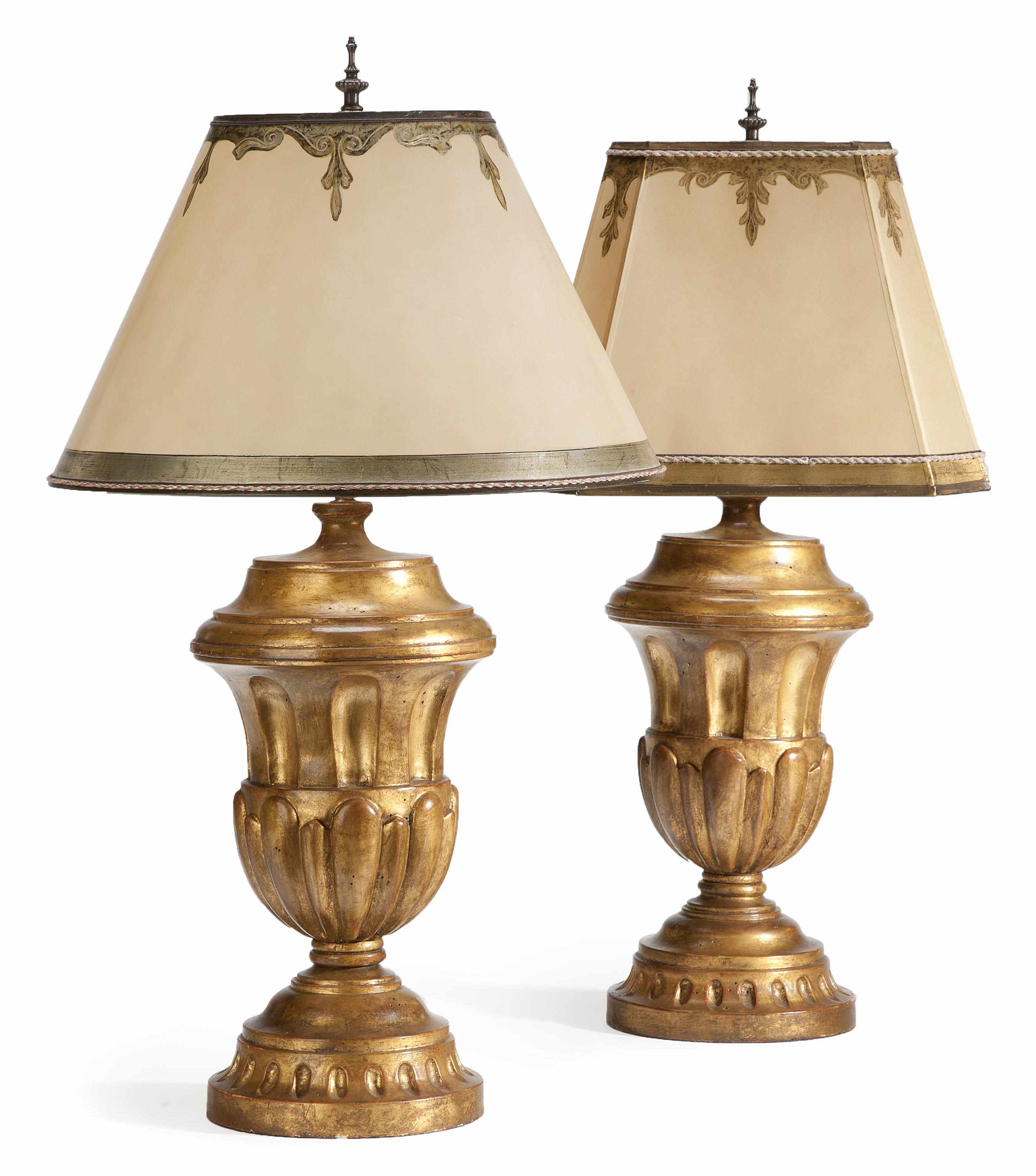 Appraisal: A pair of Neoclassical style giltwood table lamps of fluted