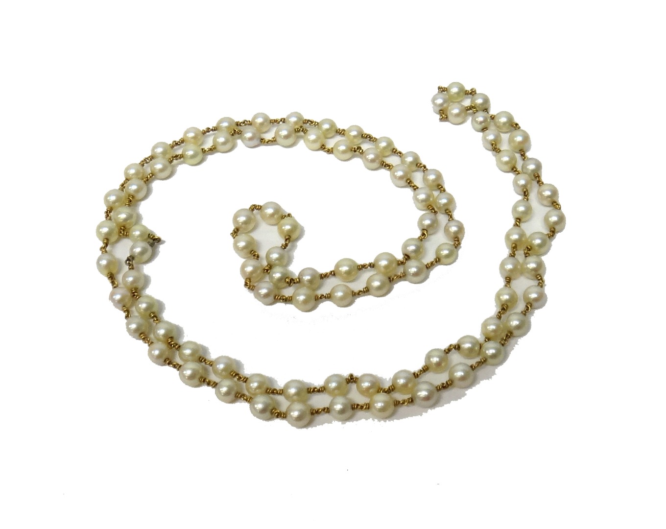 Appraisal: A gold and cultured pearl necklace the multiple link chain