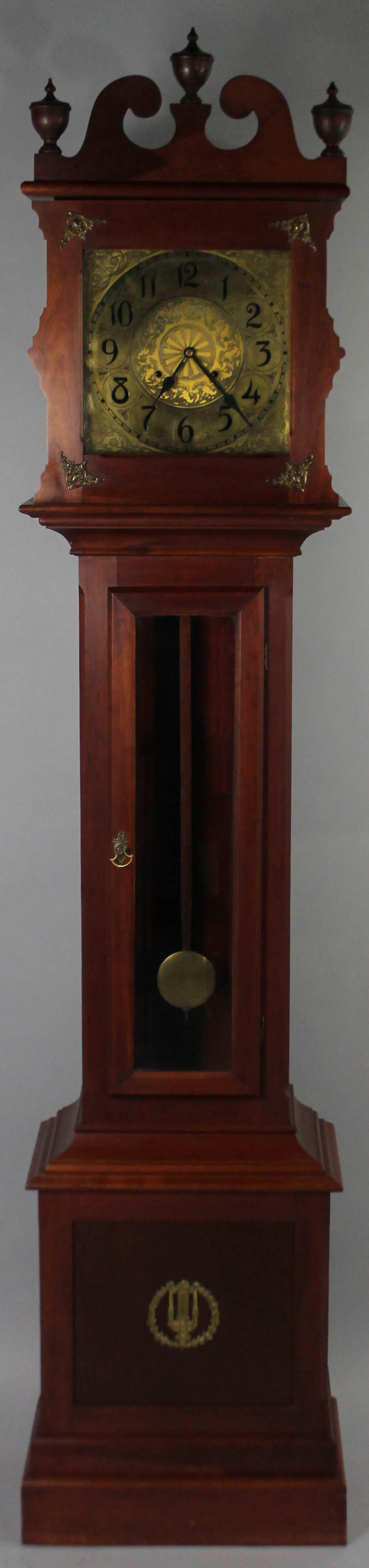 Appraisal: CHERRYWOOD TALL CASE CLOCK WITH BRASS MOUNTS having a swan