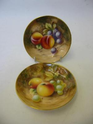 Appraisal: A PAIR OF ROYAL WORCESTER PORCELAIN DISHES c of circular