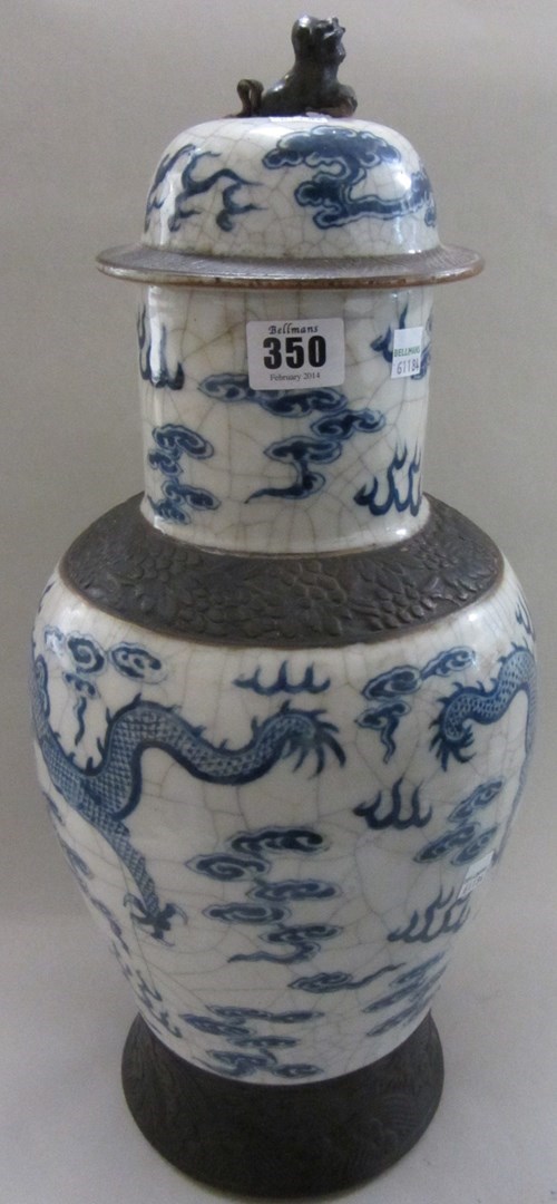 Appraisal: A Chinese blue and white crackle glazed baluster vase and