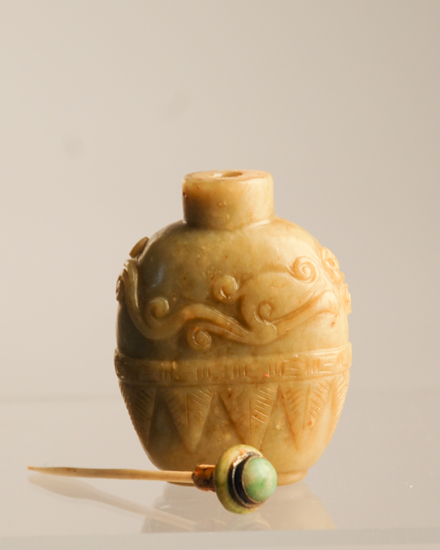 Appraisal: A th C Carved Jade Snuff Bottle ovoid in form