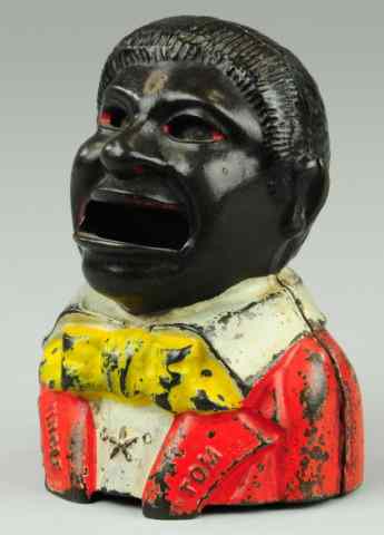 Appraisal: UNCLE TOM WITH STAR MECHANICAL BANK Kyser Rex Co designed