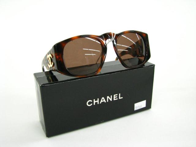 Appraisal: Chanel classic tortoise shell sunglasses with iconic quilted design arms