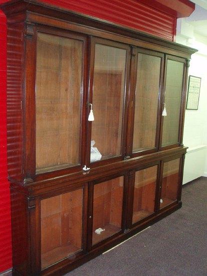 Appraisal: A Victorian mahogany bookcase the moulded cornice above four glazed