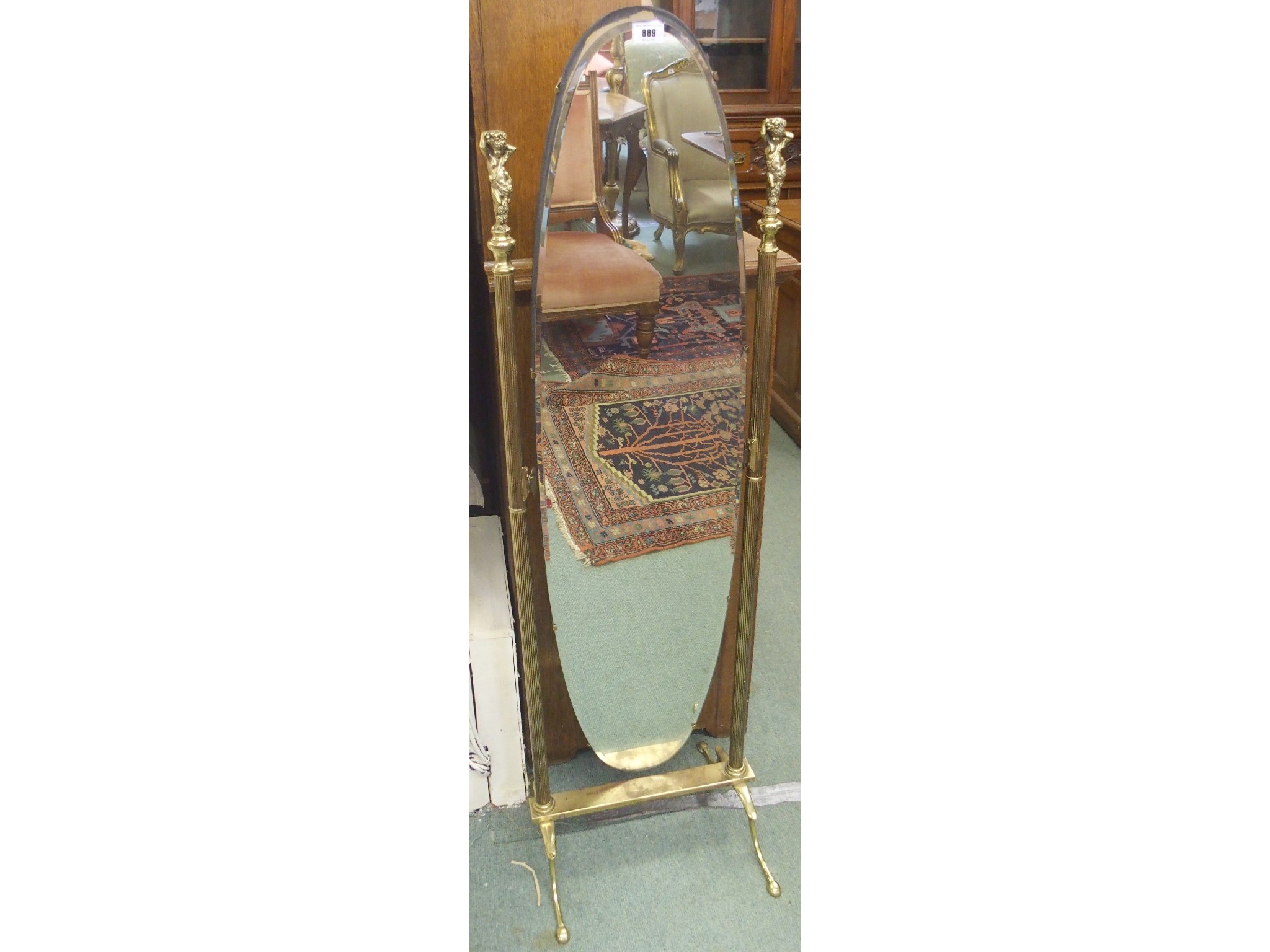 Appraisal: A brass cheval mirror