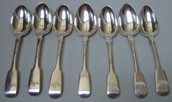 Appraisal: Three silver fiddle pattern dessert spoons London and four further