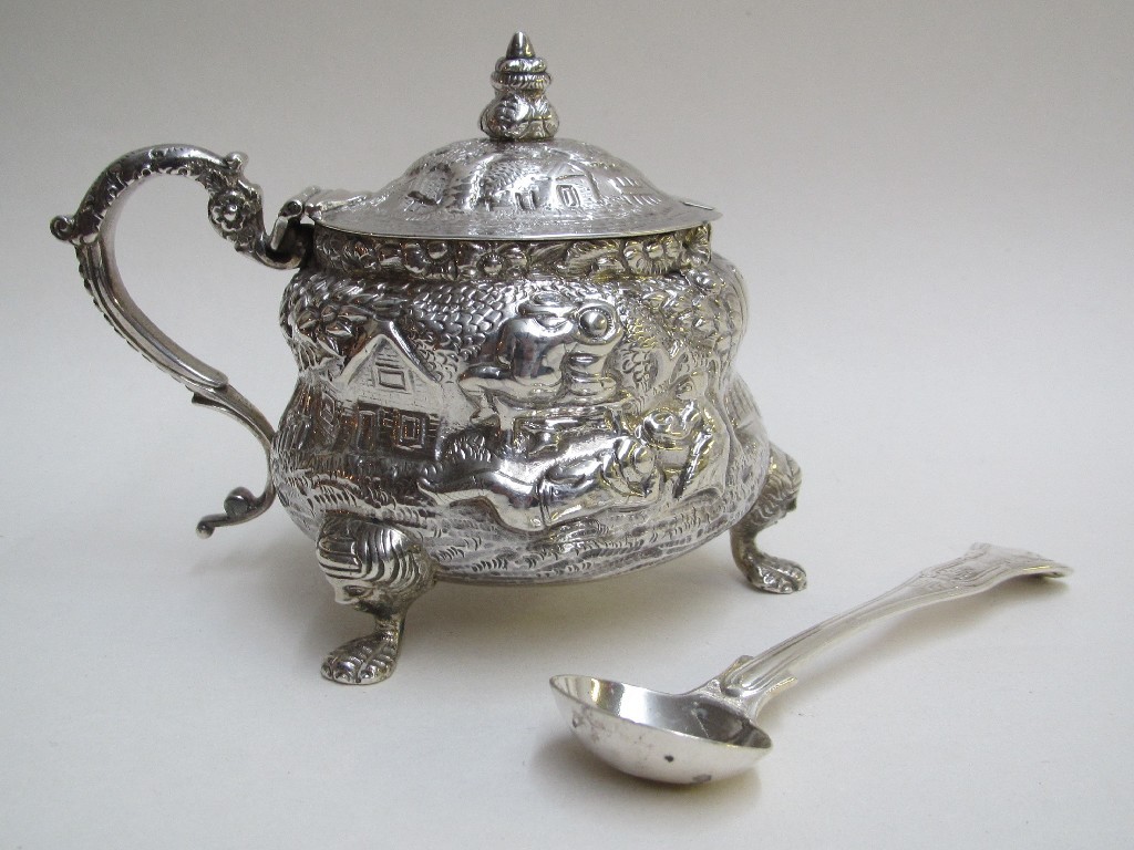 Appraisal: A Victorian silver mustard pot embossed and chased with country