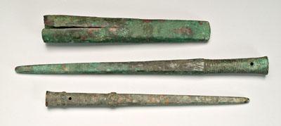 Appraisal: Three ancient bronze spear points two decorated round mounts with